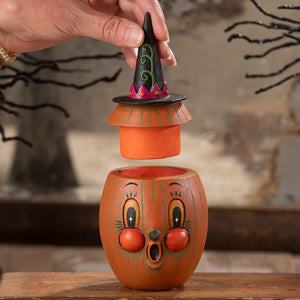 Orange pumpkin-shaped ceramic jar with black witch hat lid green swirls and pink trim gourdy orange-o-ween jar bethany lowe designs