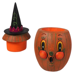 Orange pumpkin-shaped candle holder with painted face and green stripes from bethany lowe designs gourdy orange-o-ween jar