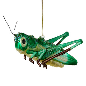 Green glass grasshopper ornament with glittery details and gold string hanger perfect for animal ornaments display