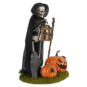 Black hooded graveyard gideon skeleton figurine holding lantern and staff with pumpkins on mossy base skeleton decor figures