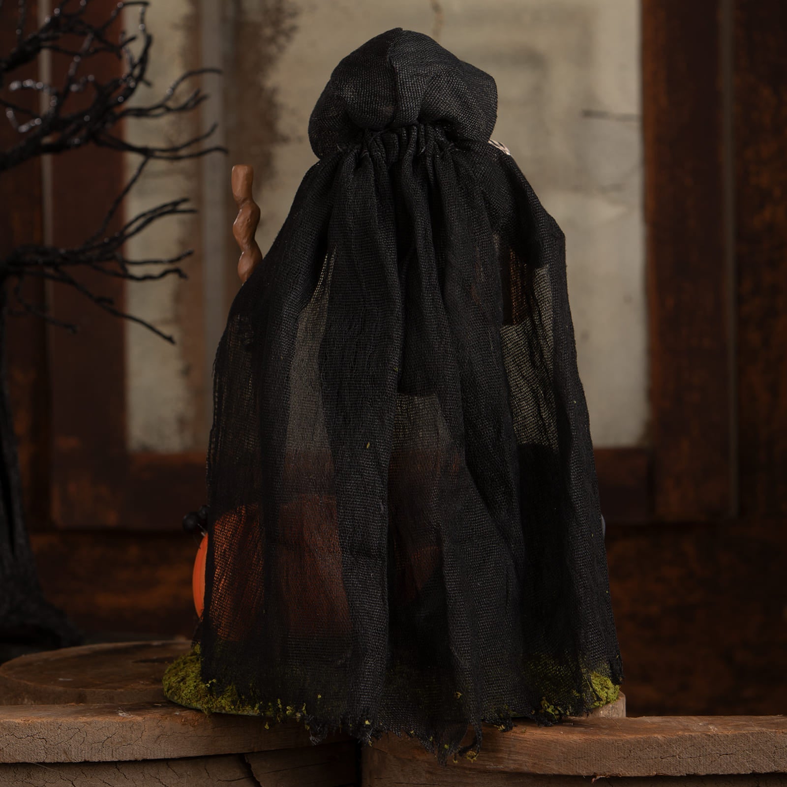 Black hooded cloak with drawstring neckline and sheer textured fabric in graveyard gideon skeleton decor figure
