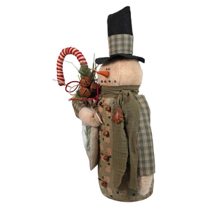 A rustic green attire pencil snowman holding stocking with a black plaid hat and buttoned coat with snowmen patterns
