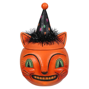 Orange cat-shaped candy jar with black polka-dotted jester hat and tinsel perfect for halloween cats and green eyed copper cat fans