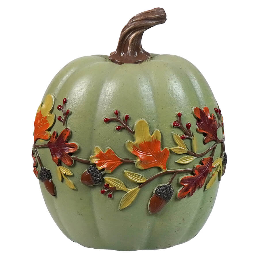 Decorative green pumpkin with autumn leaf and acorn embellishments.