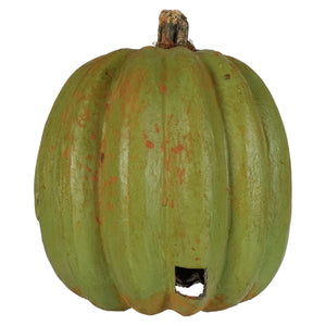 A rustic green ghost faced pumpkin with a weathered textured surface and subtle orange patches perfect for halloween pumpkins and gourds