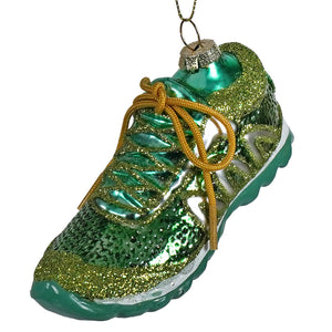 Green running shoe ornament with sparkling green and gold glitter, metallic teal toe cap, white midsole, and golden laces