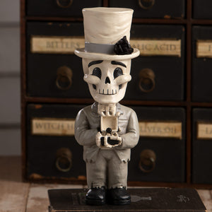 Groom mortimer skelly skeleton decor figure in gray suit and top hat holding an open box with black rose inside