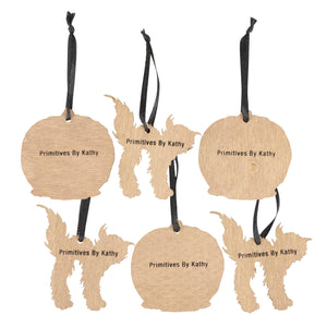 Light brown wooden dog shaped and round mini ornament set with black ribbons engraved primitives by kathy for halloween