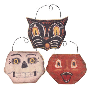Set of three vintage-style halloween faces ornament set featuring a black cat skull and red devil for hanging decor