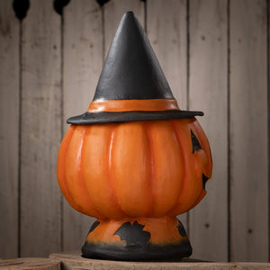Orange halloween jack o lantern pumpkin decoration with black witch hat and carved face for halloween pumpkins and gourds