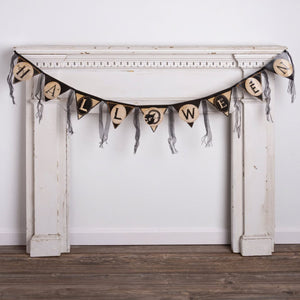 Black and beige halloween pennant garland with triangular flags featuring letters and spooky designs for halloween decor