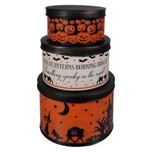 Set of three stacked halloween vintage tins by bethany lowe with black lids and spooky pumpkin bats witch designs