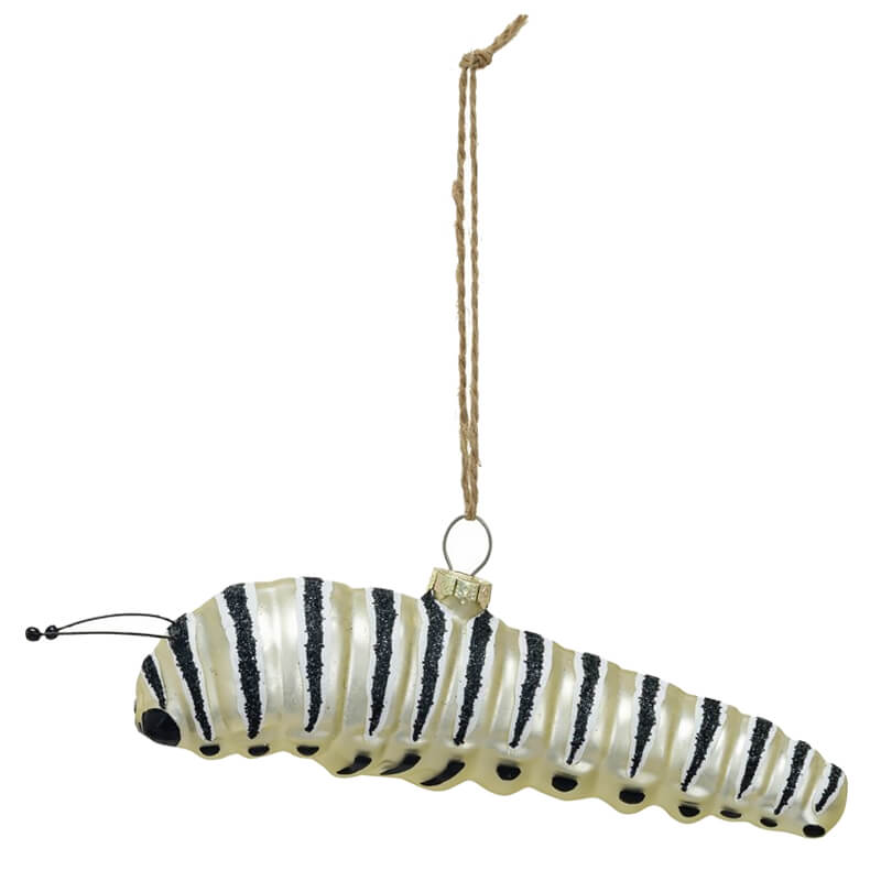 Striped caterpillar-shaped ornament with a hanging string attached.