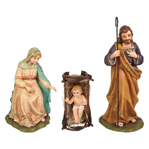 Handcrafted holy family three-piece nativity set with painted resin mary in peach teal and joseph in blue robe holding staff