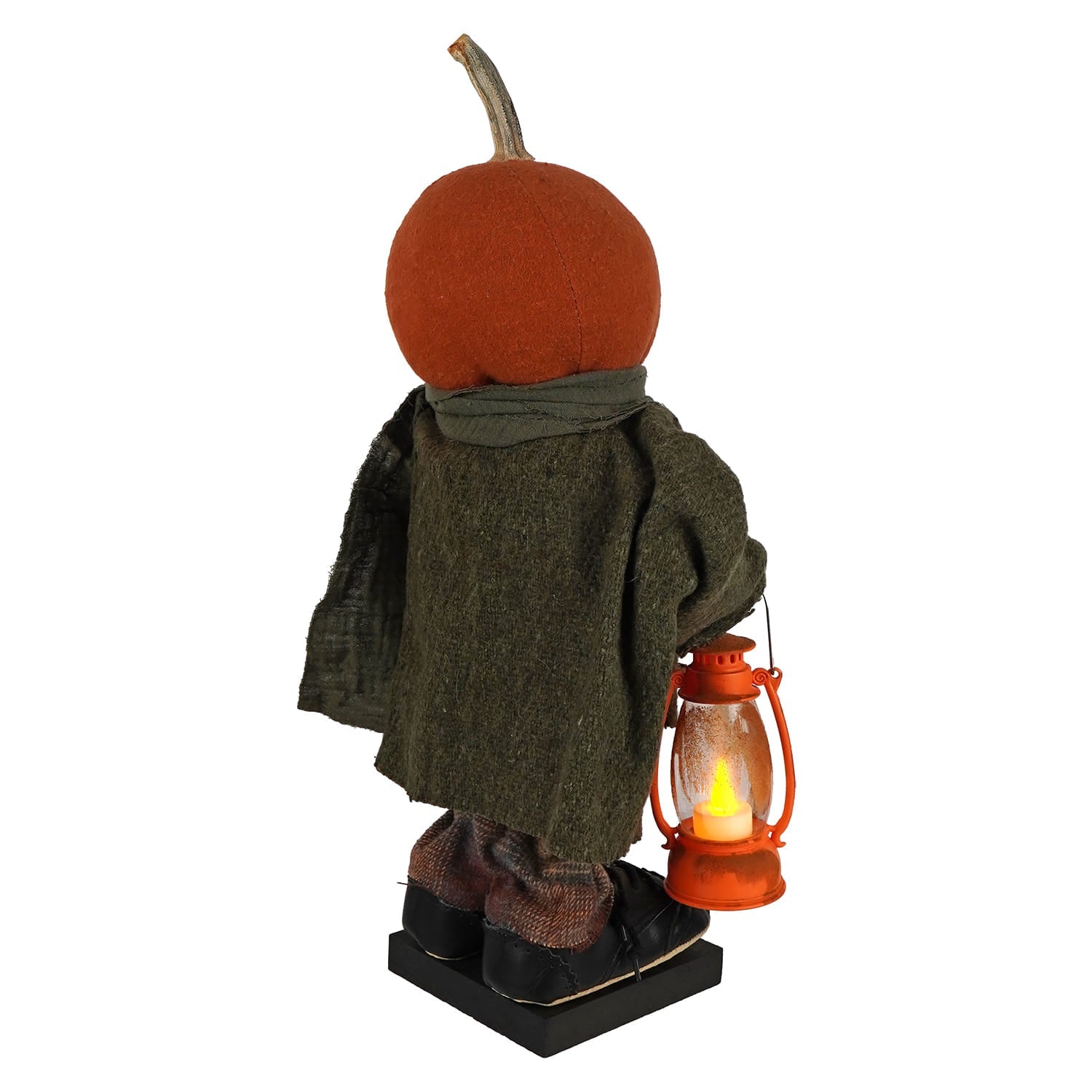 Handcrafted large standing fall colors scarecrow with orange pumpkin head wearing dark green wool coat holding glowing lantern