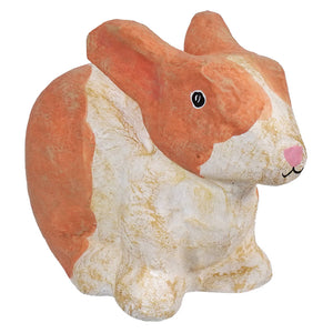 Orange and white ceramic squirrel figurine with a pink nose.