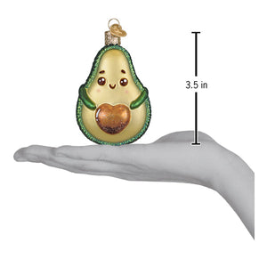Happy avocado ornament figural decor made of green and beige glass with glittery edges and a golden heart pit perfect as avocado ornament or tree toppers