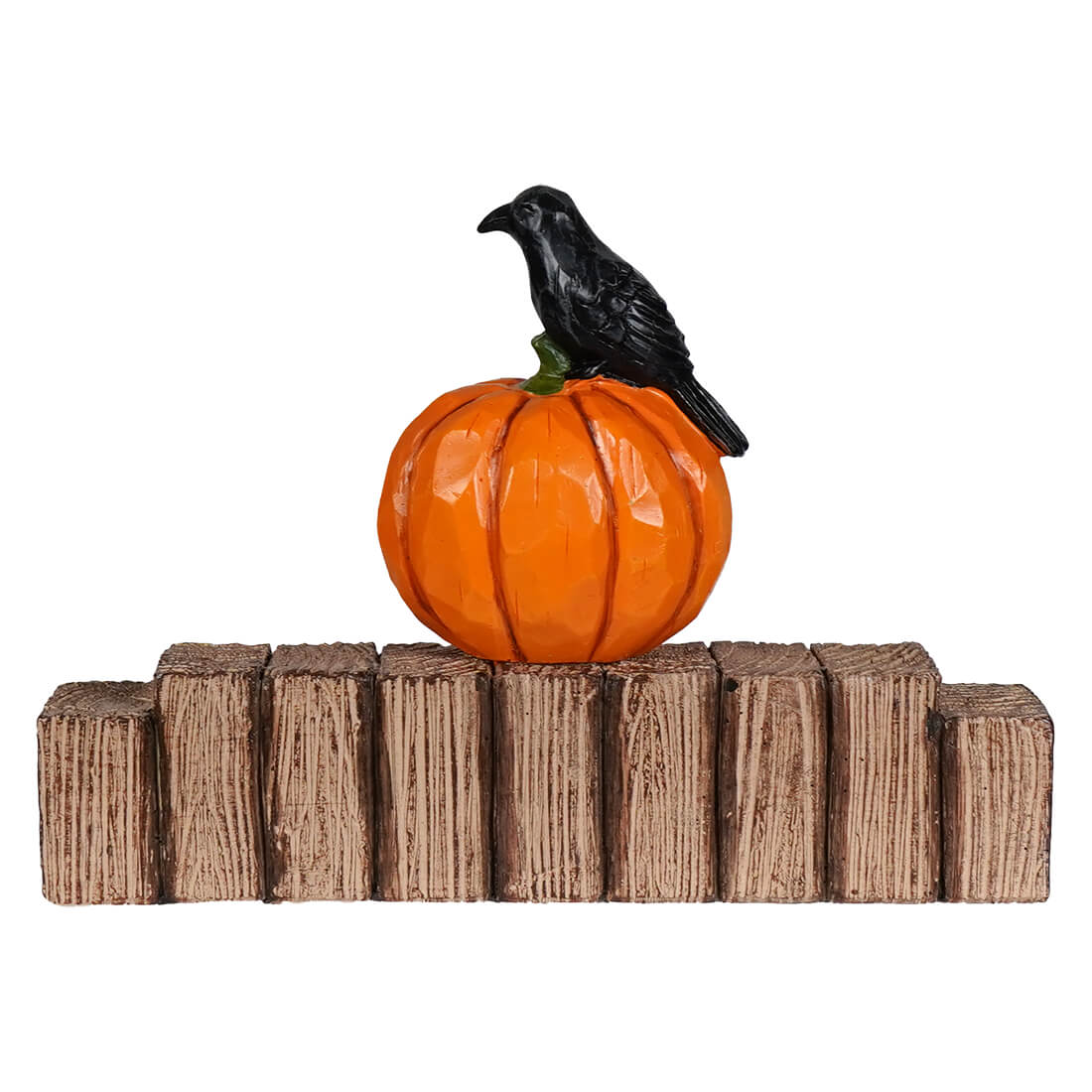 A glossy orange halloween jack-o’-lantern with a black crow on top on a rustic wooden base tabletop decor