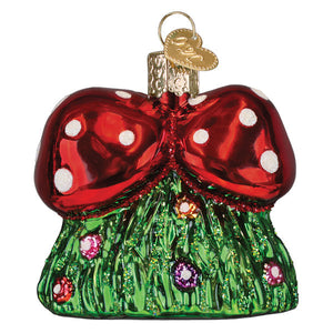 Happy mushrooms ornament is a glossy red and green christmas glass ornament shaped like a bow-tied mushroom house skirt with white polka dots and colorful glittery details