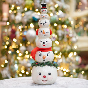 Happy snowman stack ceramic christmas snowman figures tower with five smiling faces in red scarves and top hat decor