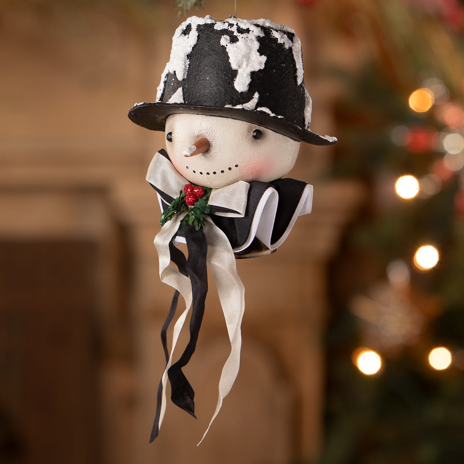 A charming black and white snowman ornament with textured hat and rosy cheeks from bethany lowe design figural christmas icon ornaments