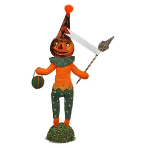 Haunting pumpkin figure is a handcrafted folk art scared pumpkin figure with an orange paper mache head and colorful clothes