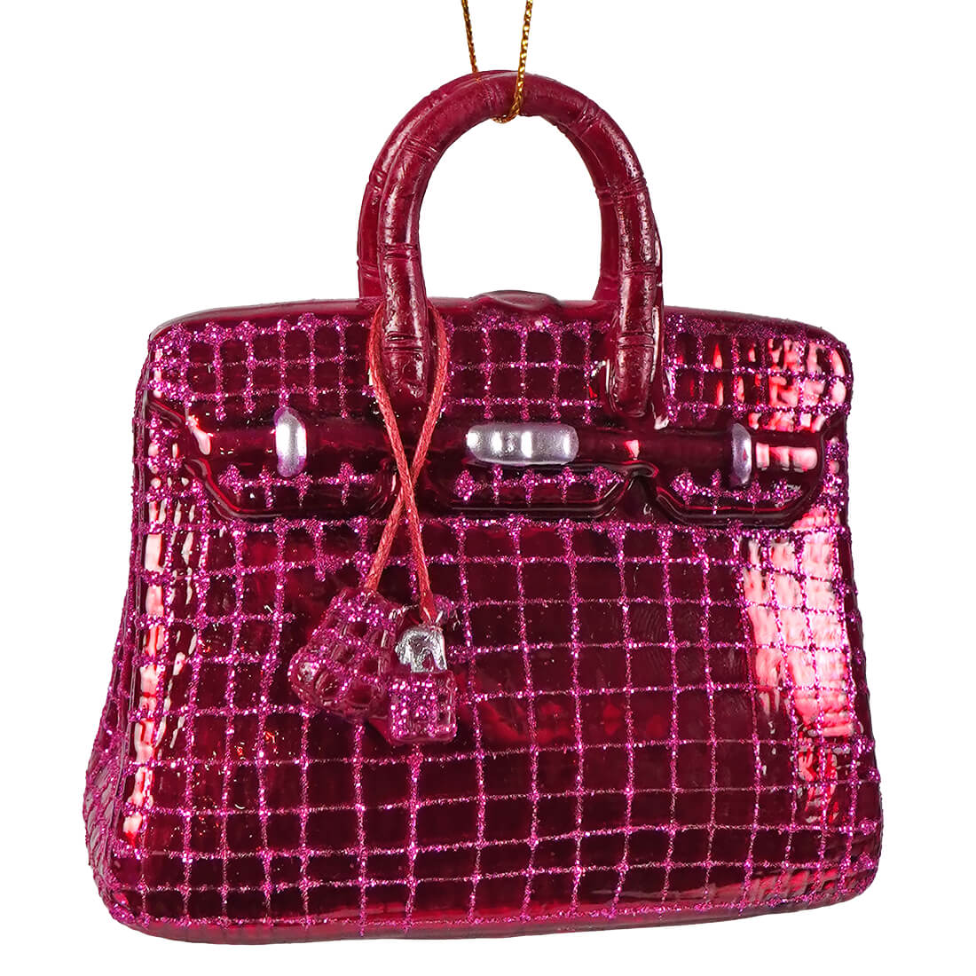 Haute handbag glass ornament in shiny fuchsia with glitter, crocodile texture, and silver hardware luxury handbag ornament