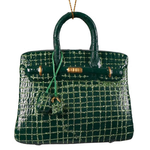 Deep green glittery crocodile-embossed haute handbag glass ornament with gold hardware and matching tassel luxury handbag ornament