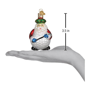 Glass santa ornament with textured white body red sleeves black boots and green hat holding blue tools for christmas decor