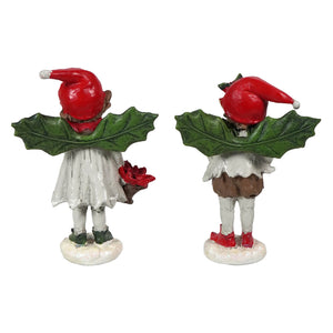 Two hand-painted holly elf figure set with red hats green holly capes and a girl figure holding a poinsettia flower