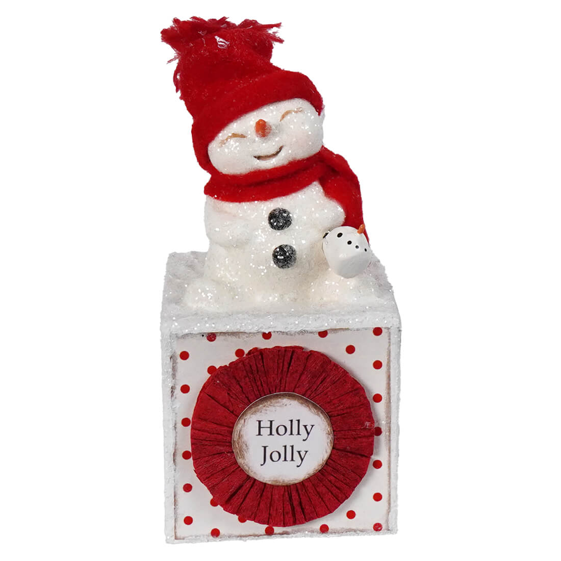 A festive white holly jolly snowgirl figurine with red fuzzy hat scarf on decorated cube base christmas snowman decor