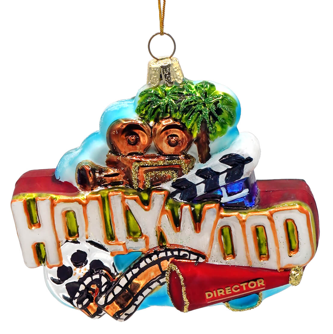 Colorful glass hollywood ornament with vintage film camera and palm trees perfect as figural decor or tree topper