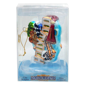 Colorful glass hollywood ornament shaped like a director’s chair with gold trim and red director banner for figural decor or tree toppers