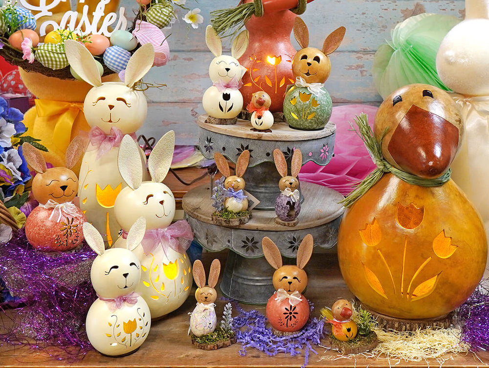 Collection of Easter-themed decorative items including rabbits and pumpkins by Meadowbrooke Gourds