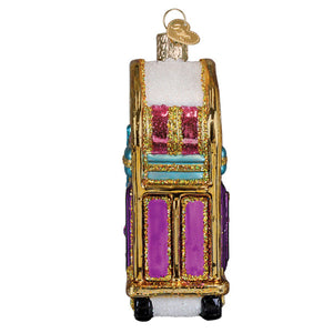 A vibrant glittery glass vintage slot machine ornament with gold trim and colorful panels perfect as suitcase ornament and figural decor