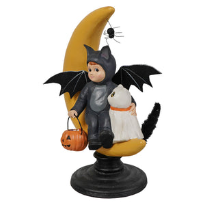 Hugh with Casper on moon halloween figural decor featuring a black bat-winged figurine and white ghost on yellow crescent moon