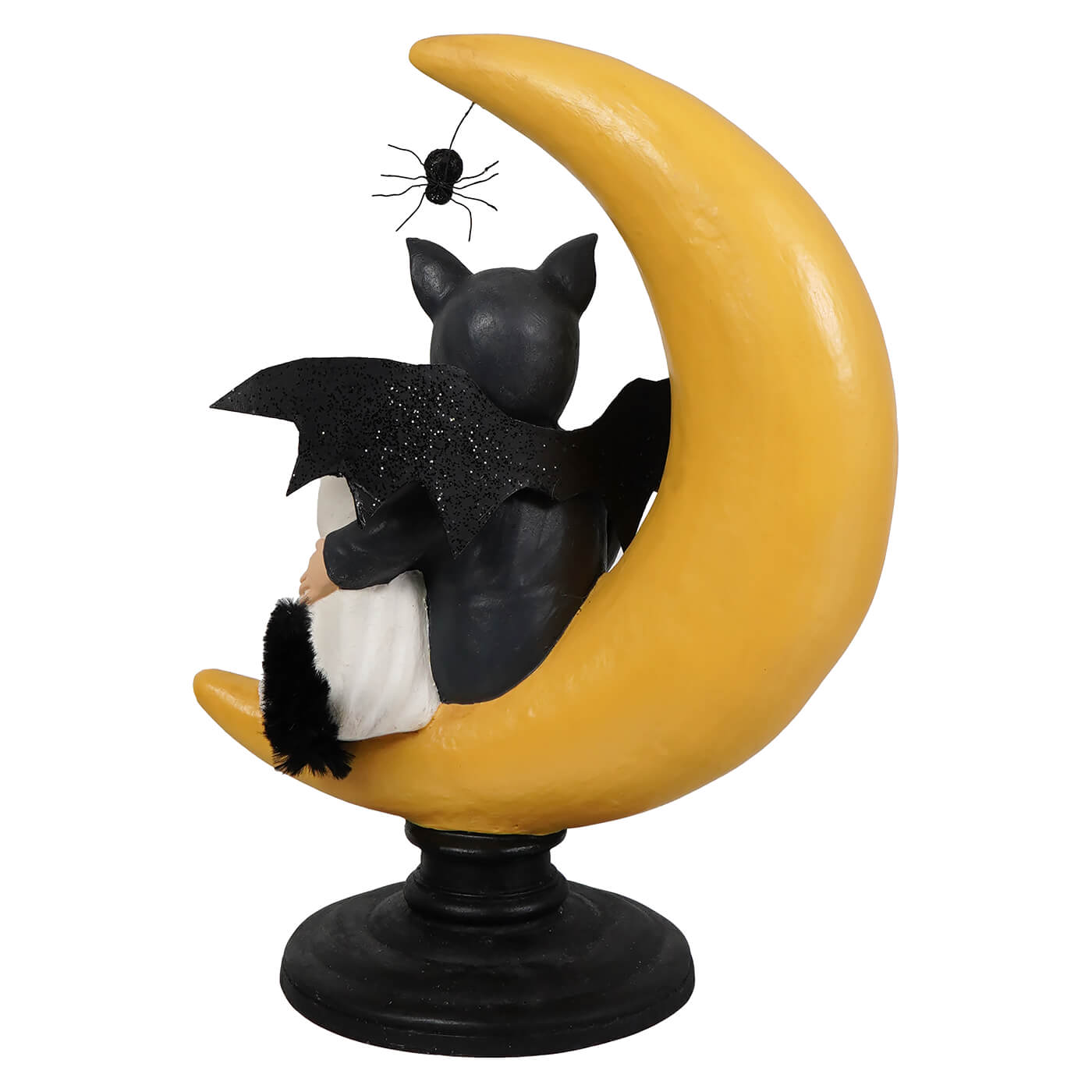 Black bat themed cat figurine with glittery wings and fluffy tail sitting on a yellow crescent moon base halloween figural decor