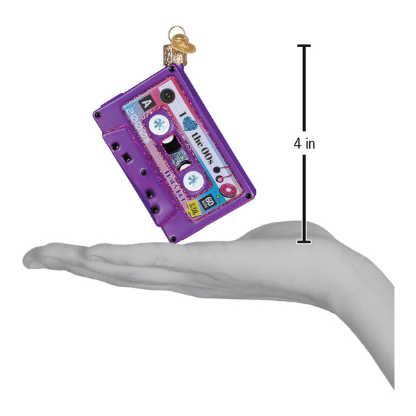 Purple glass christmas glass ornament shaped like a cassette tape with glittery details and i love the 90s text