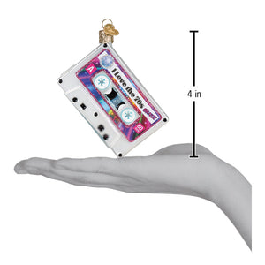 A clear glass christmas ornament shaped like a vintage cassette tape with an iridescent i love the 70s label perfect for world christmas and musical artists & instrument ornaments collections