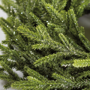 Ice 14 inch christmas wreath with faux green pine branches and subtle glittery accents by annie schickel