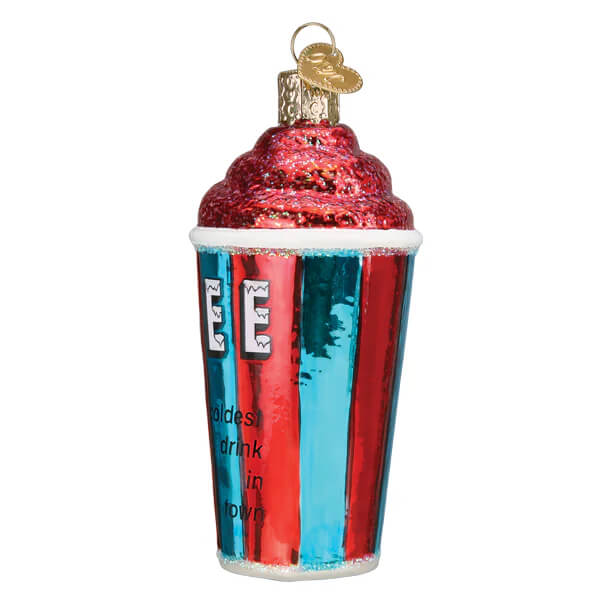 A festive icee ornament shaped like a red and blue striped glass cup with glittery pink whipped cream on top