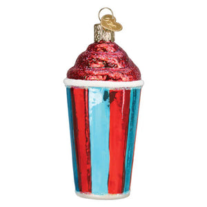 A red and blue striped glass icee ornament with glittery pink frosting top perfect as a food or drink ornament