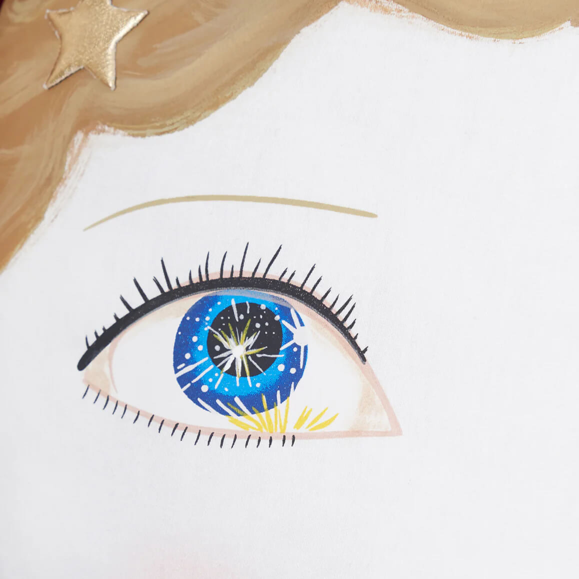 A blue eye with black lashes and starry details on an indy zombinaland decorative pillow by tracy scheff patriotic pillows