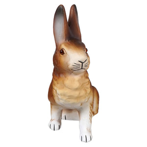 A detailed ino schaller brown sitting ceramic rabbit figurine with painted black whiskers standing on hind legs