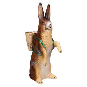 Ino schaller brown standing easter bunny resin figurine with beige tones carrying a wicker basket on its back