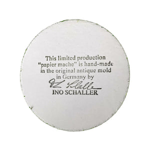 White circular papier-mâché label with limited production text from ino schaller easter german paper bunny product