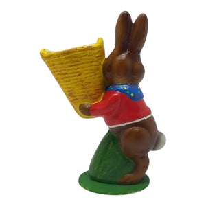 Ino schaller easter bunny figurine in german paper mache wearing red shirt holding yellow basket with blue scarf