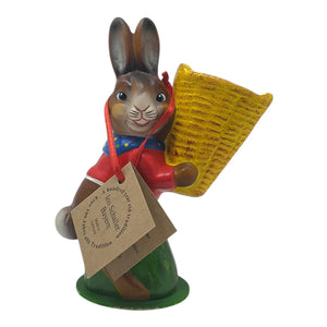 A charming ino schaller easter bunny figurine in german paper mache with red coat blue scarf and yellow basket