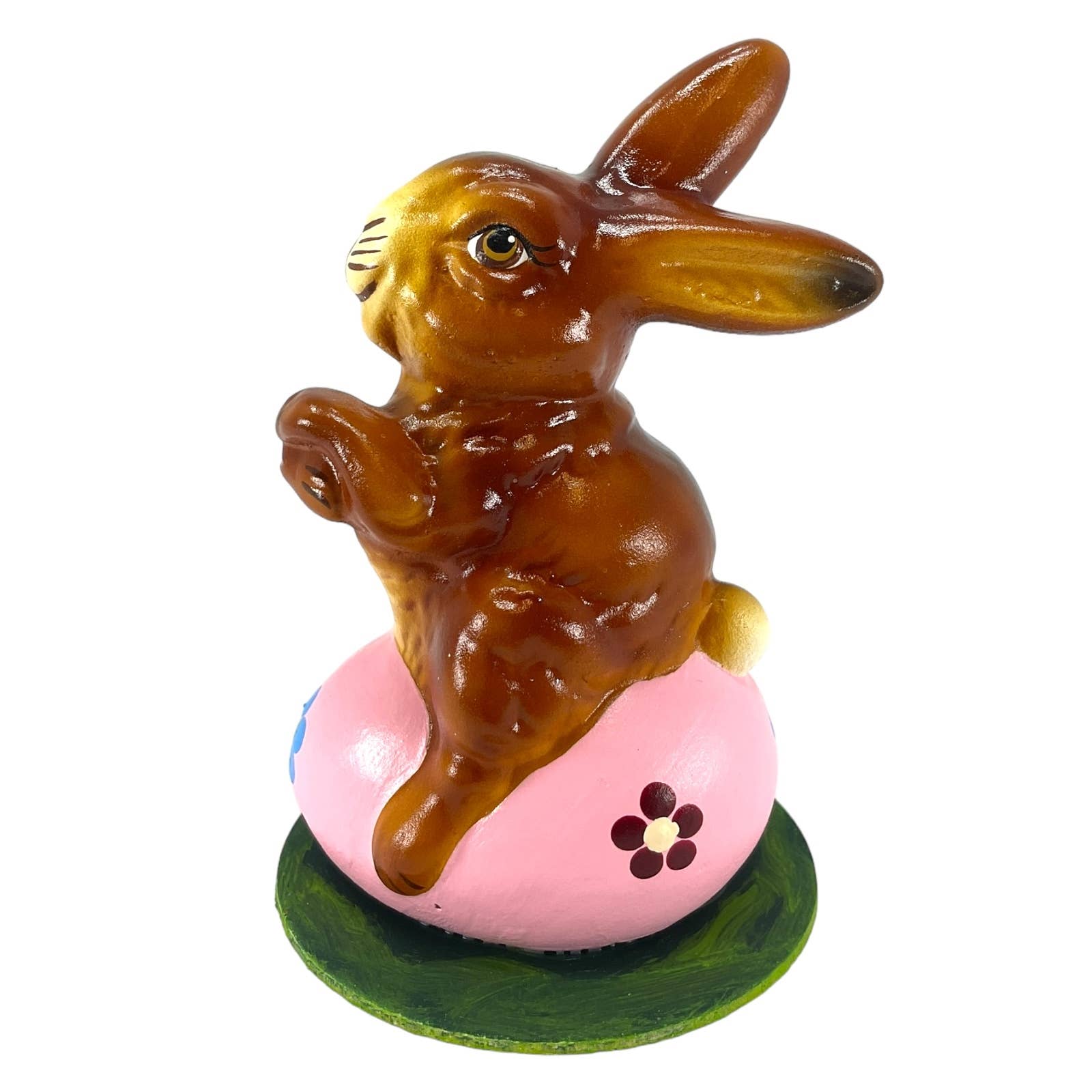 Glossy brown ino schaller easter bunny figurine on pink hand-painted paper mache egg with green base