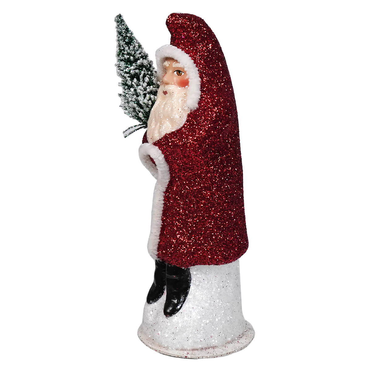 Glittery red Santa Claus figurine holding a small Christmas tree.